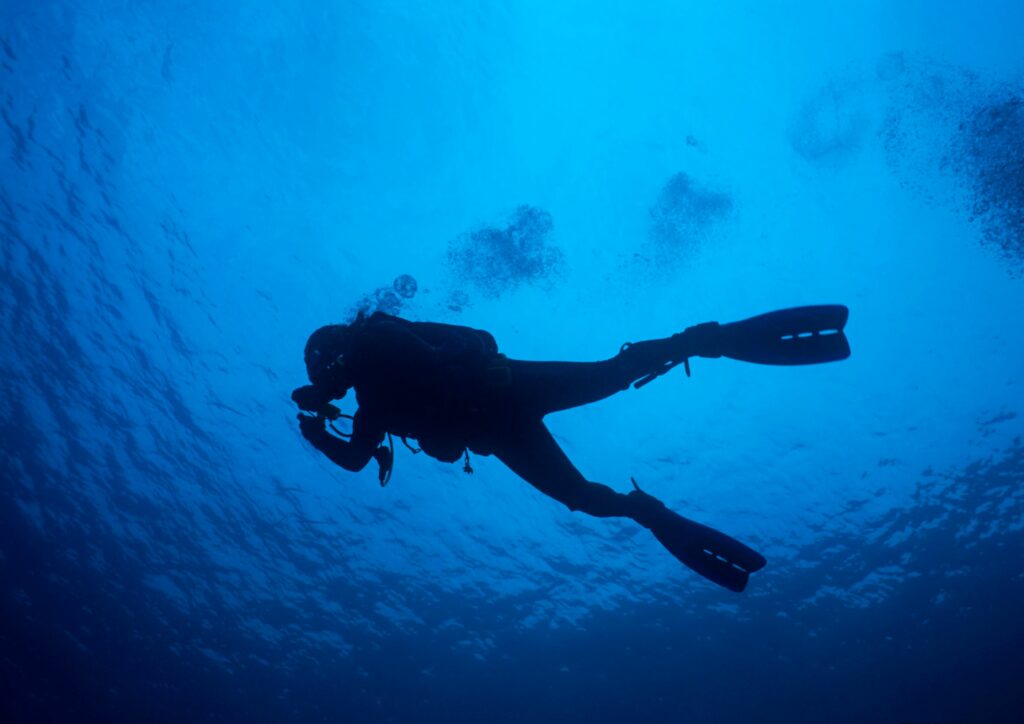 Basic Scuba Diving Skills - Breathing diver blue seawater
