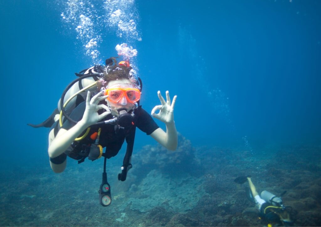 Diver with OK hand sign