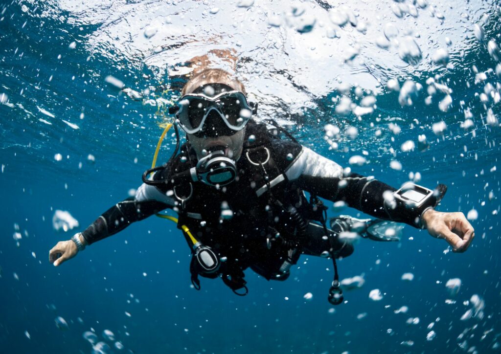 scuba diving - diver in water