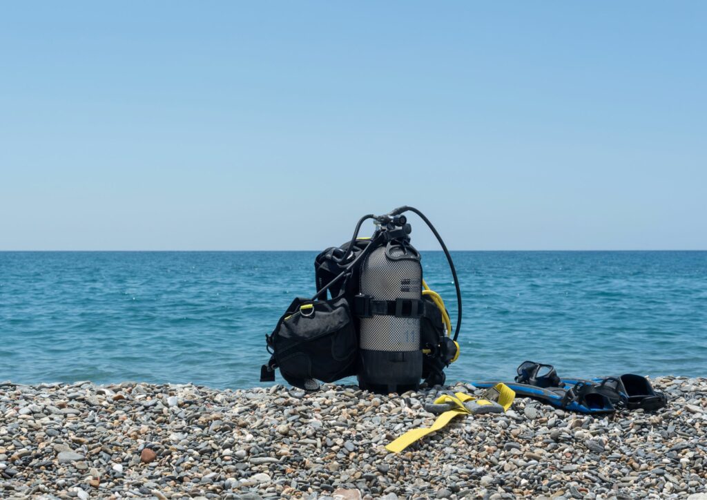 Bali diving - equipment by the sea pebble