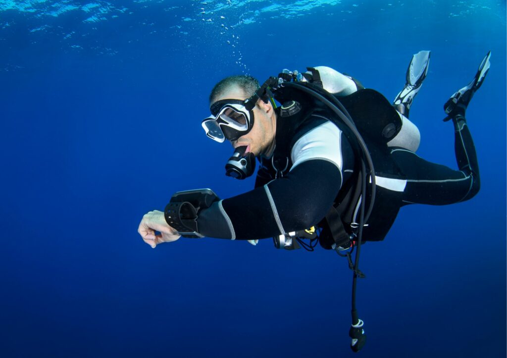 Bali open water course - diver with dive computer
