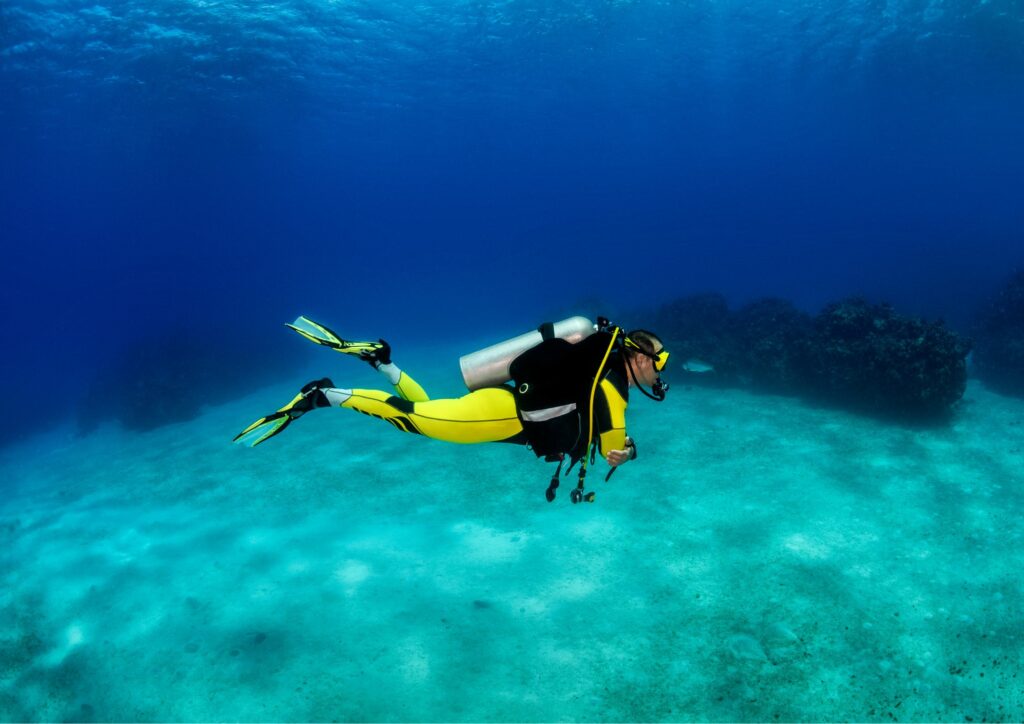 dive safety - diver in yellow